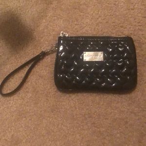 Betsey Johnson wristlet in patent black.